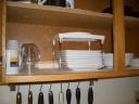 stacking tray in cupboard