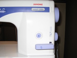 Janome 1600P-DBX auto thread cutter