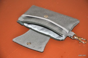 two pockets and a flap with snap closure